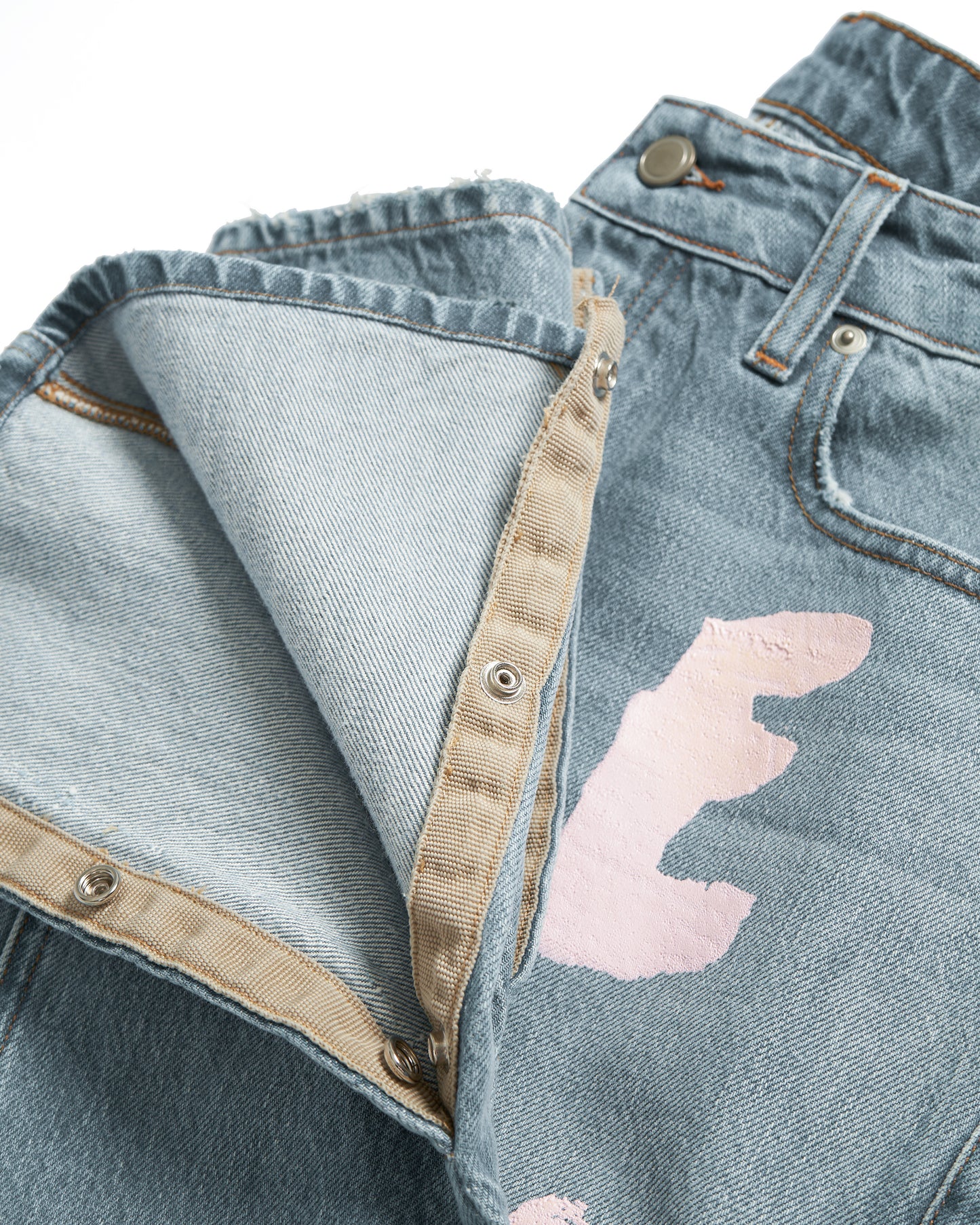 BLEACH WASH JEANS WITH PRINT - Due Diligence Apparel